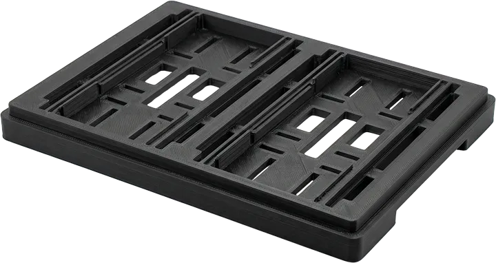 fdm-printing-esd-antistatic-pcb-carrier-tray copy Üretim hatları için FDM teknolojisiyle ESD (Antistatik) malzeme kullanılarak basılmış siyah PCB taşıyıcı ve montaj fikstürü.